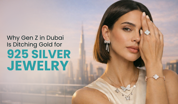 Gen Z young woman Dubai wearing stacked 925 sterling silver jewelry modern style