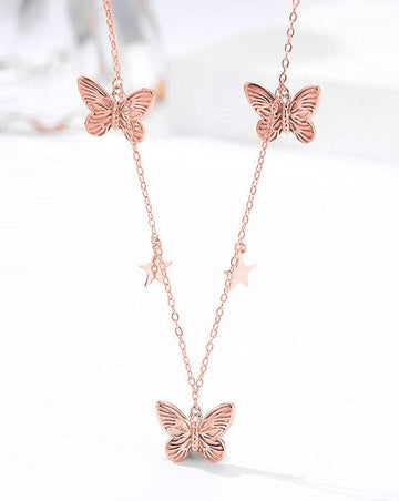 Starlit Wings Silver Charm Necklace