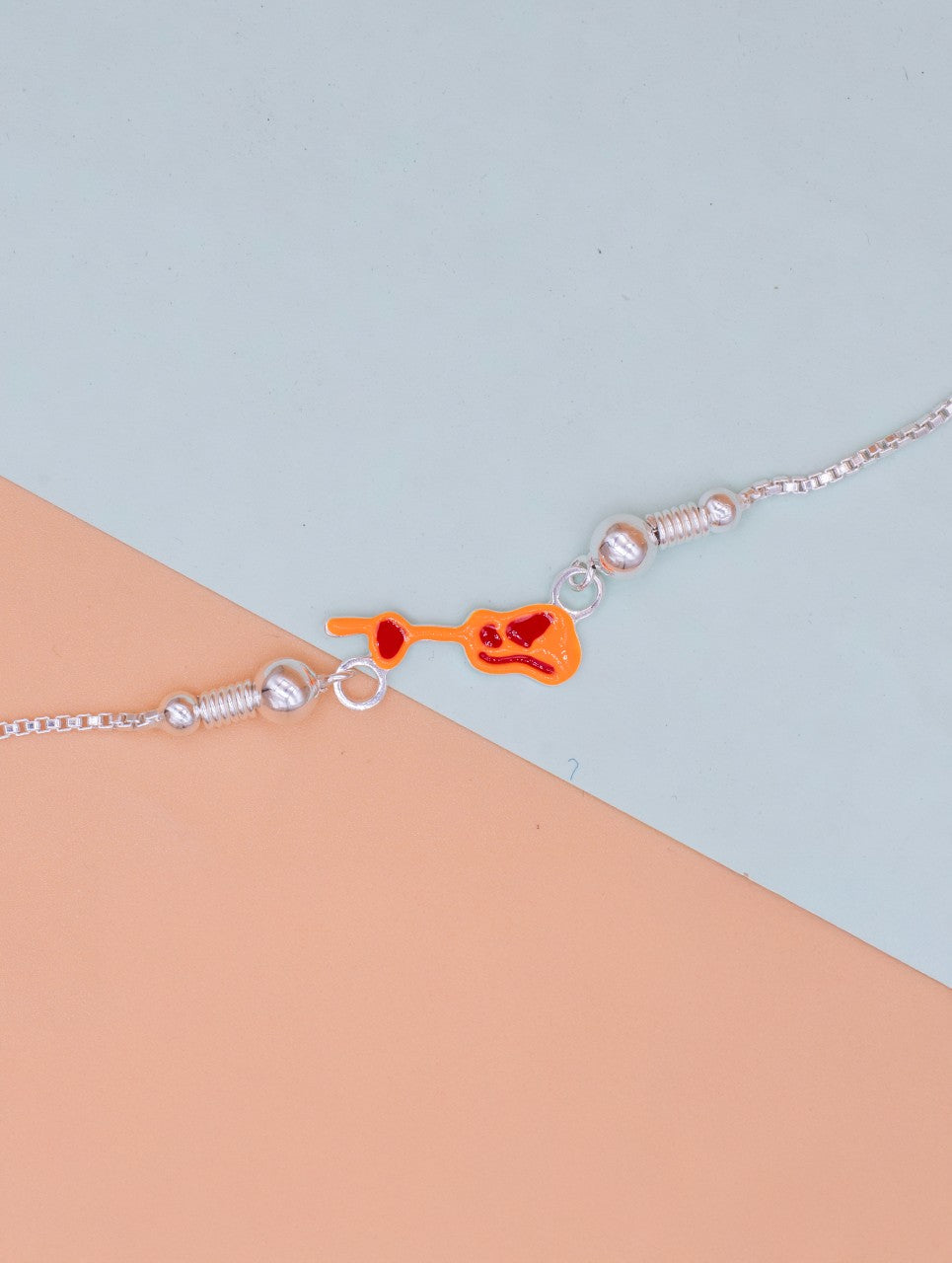 Silver Guitar Rakhi Bracelet