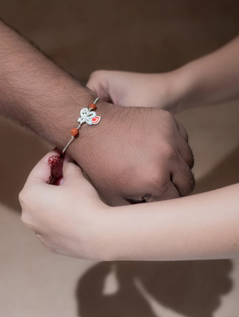 Silver Peacock Rakhi with Rudraksha Beads