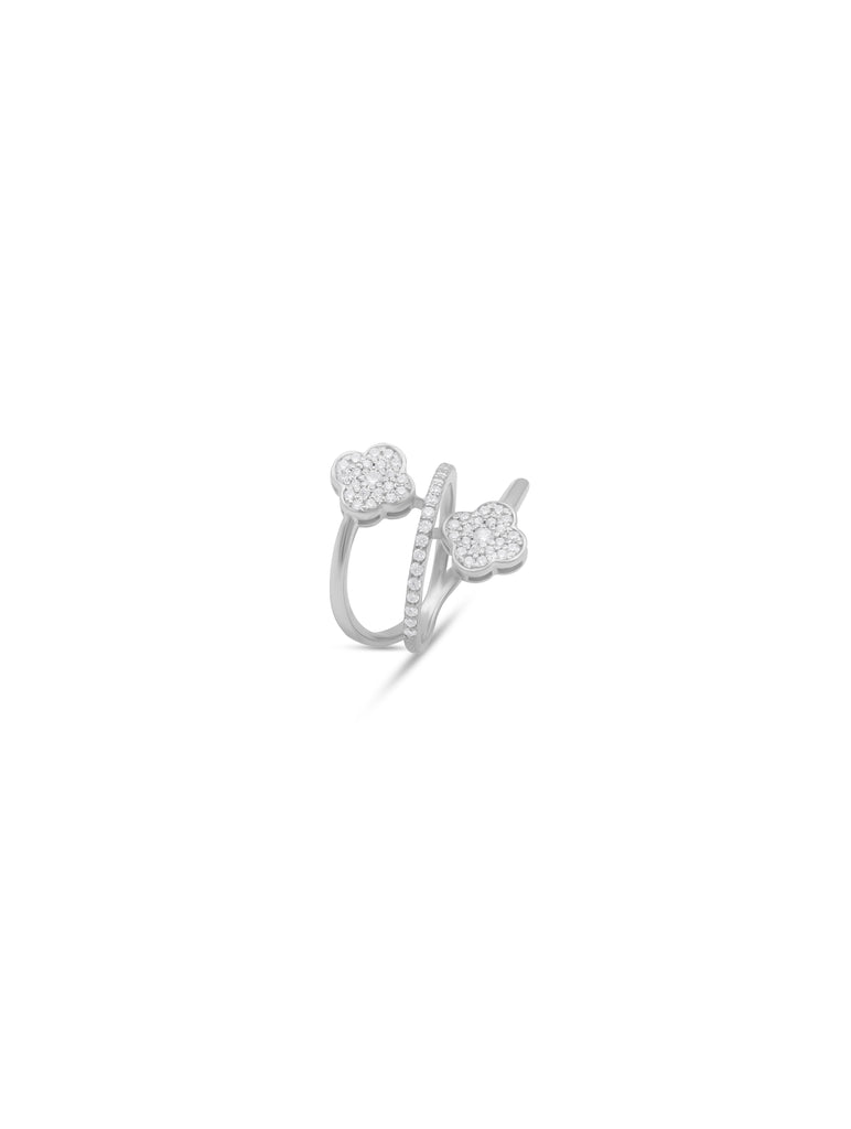 Silver ring with bow design on a white background