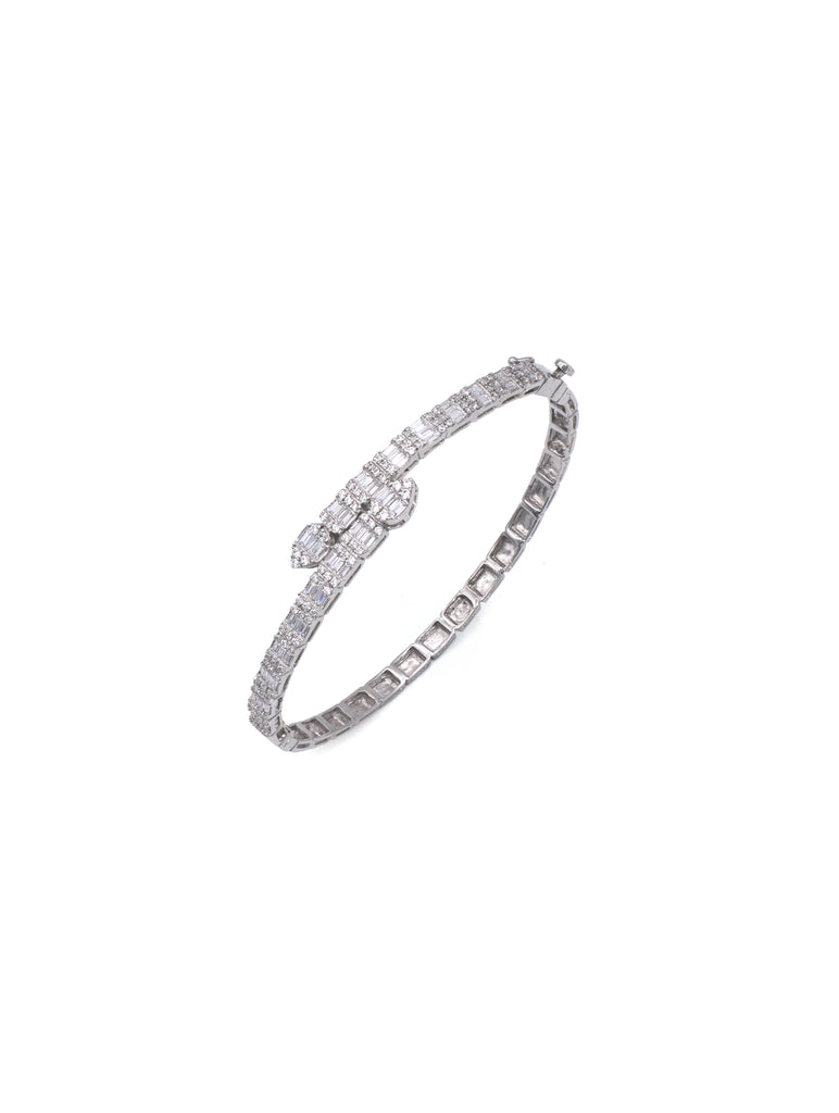 Silver bracelet with clear stones on a white background