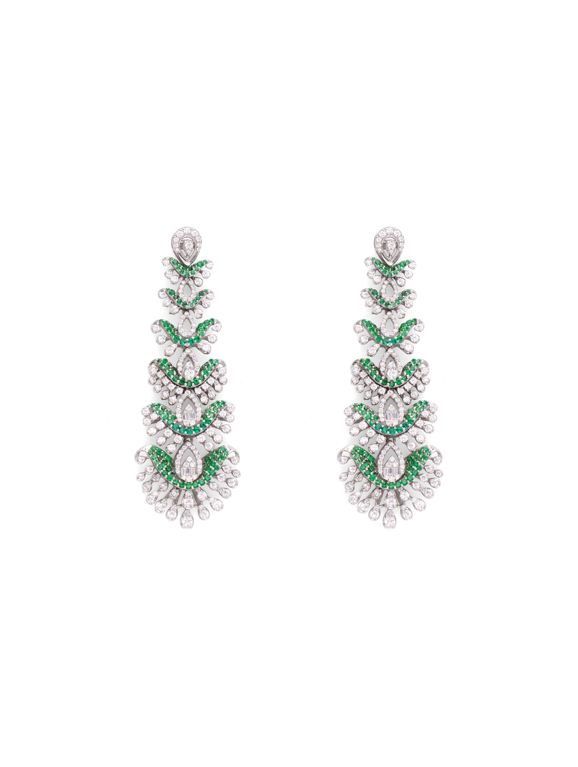 Pair of earrings with green and clear gemstones on a white background