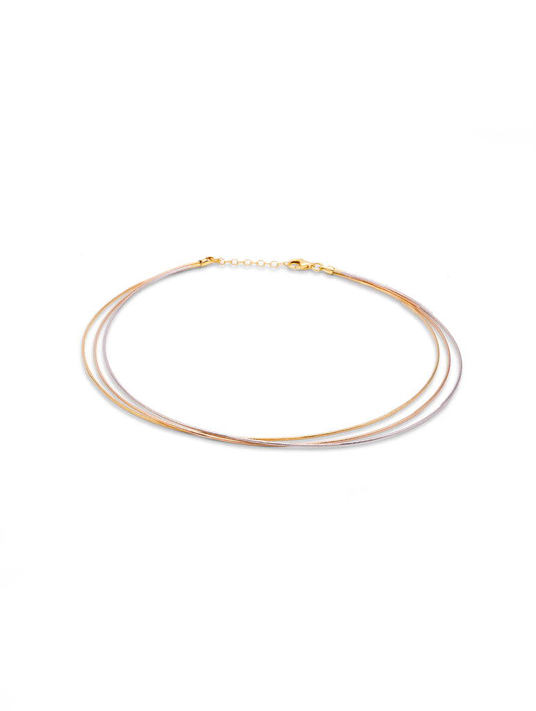 Gold necklace on a white background